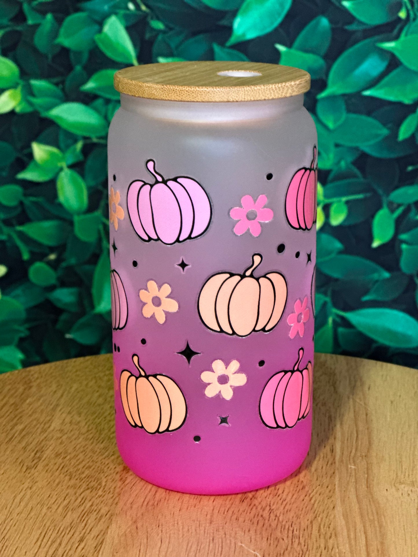 Pastel Pumpkins on frosted pink glass cup